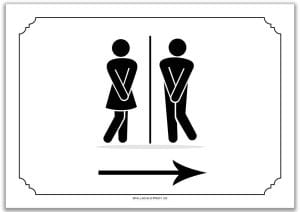 Ein schwarz-weißes Turnier | WC-Schild rechts mit einem Mann und einer Frau, die nebeneinander stehen.